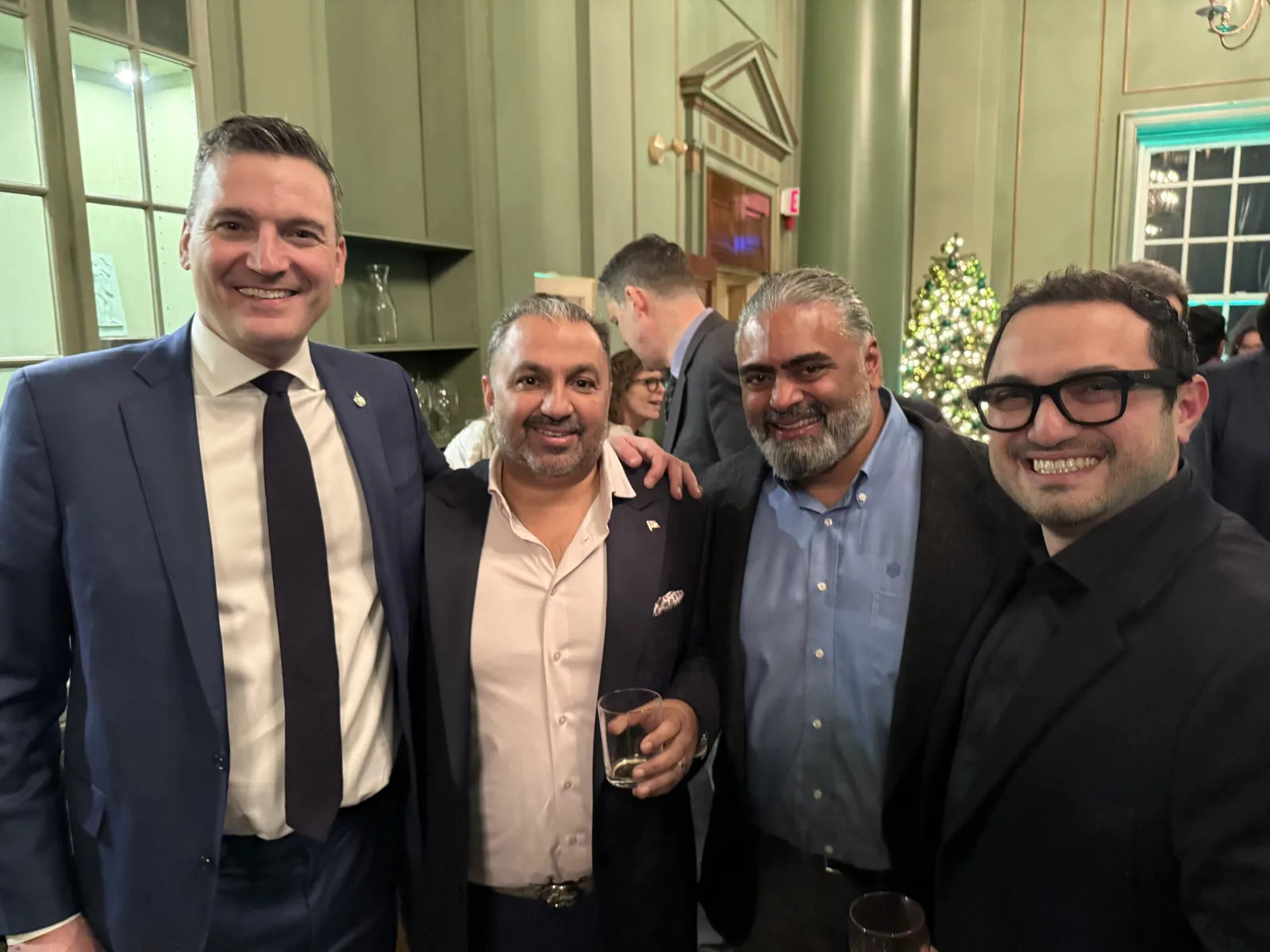 Zulq Malik and Vinay Nair of SMARTBUILD with Canada's Minister of AI and Digital Innovation Evan Solomon in Toronto